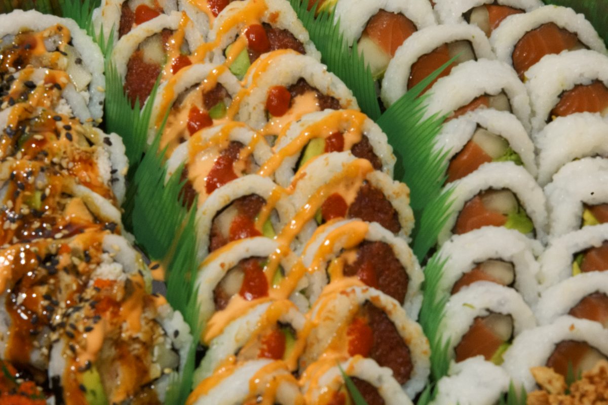 Fresh salmon sushi made by a live sushi chef